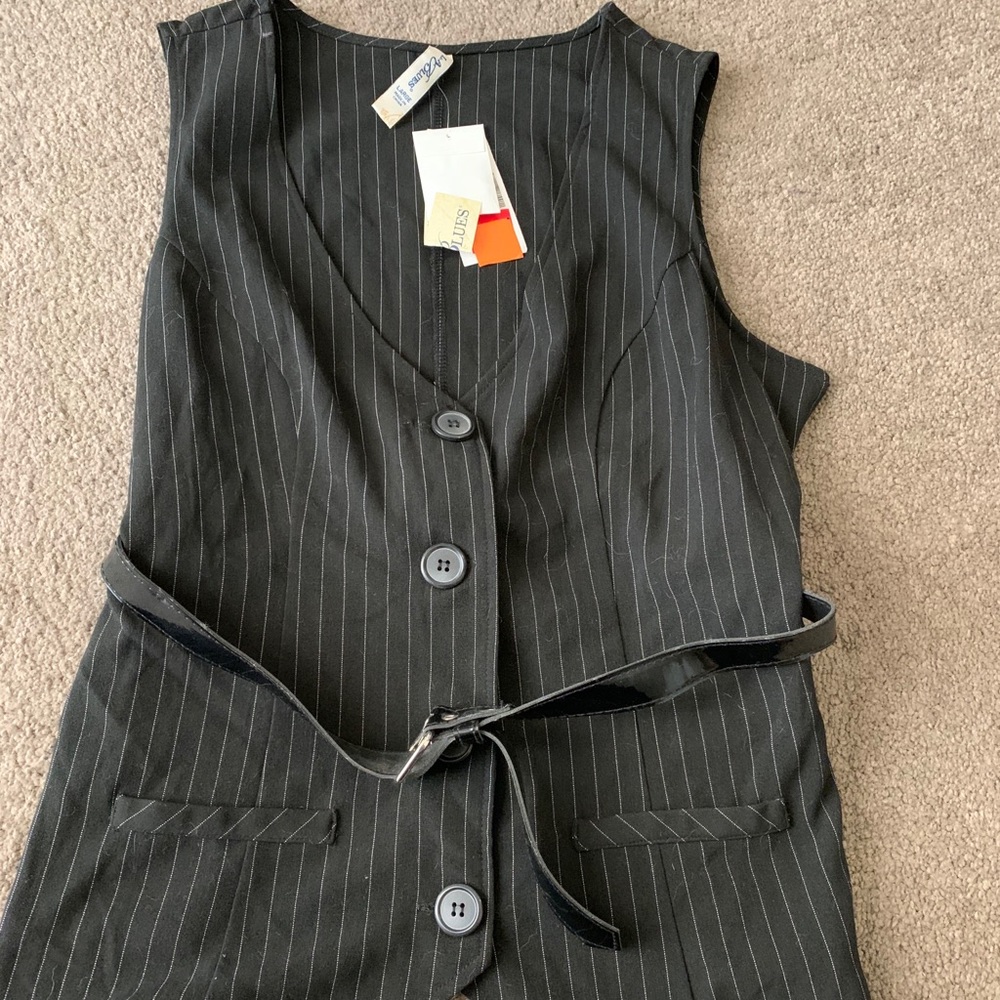 New vest. Black with white stripes and belt.